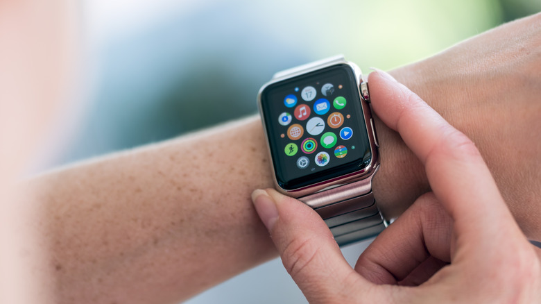 Pressing Apple Watch buttons