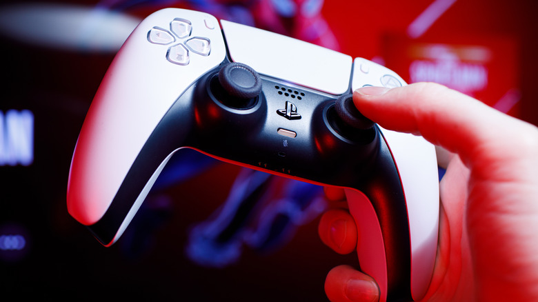 Person playing PS5 Spiderman
