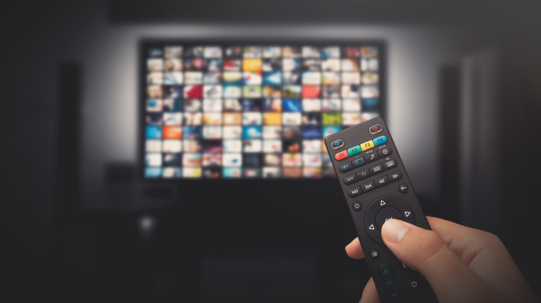 Someone using TV remote