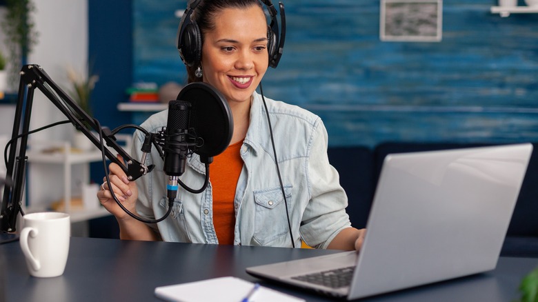 woman livestreaming on laptop