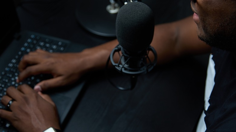 livestreaming man tapping a keyboard
