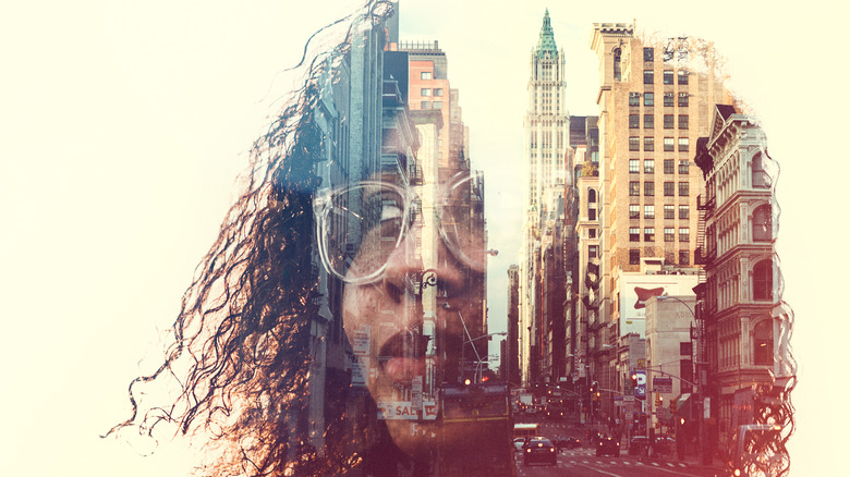 overlaying photos of city and person's head