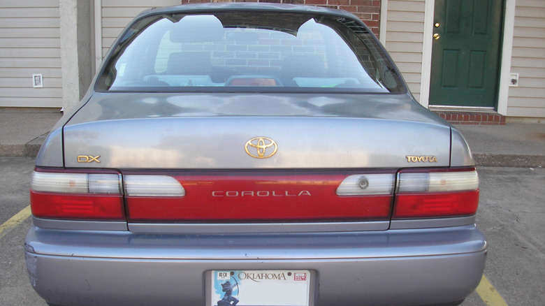 Rear view of silver 1997 Toyota Corolla DX sedan