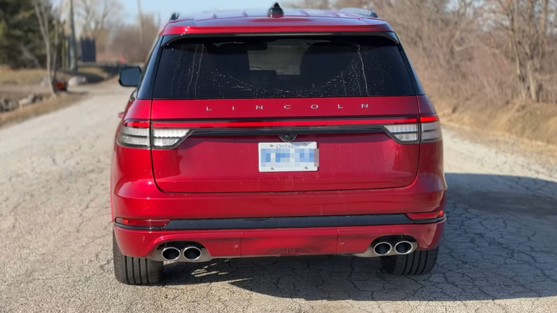 Rear view of red 2025 Lincoln Aviator SUV