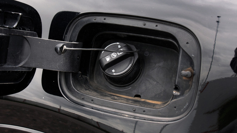 Picture displaying gas cap and flap on car