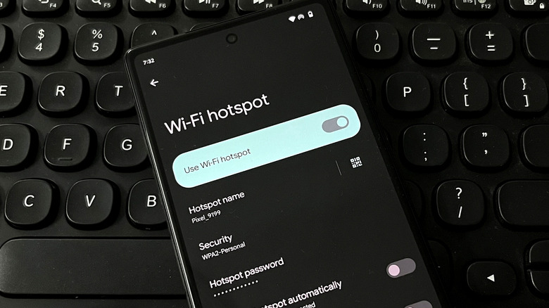 Android smartphone on keyboard