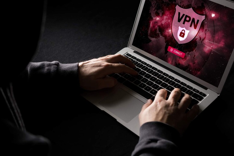 Person using VPN on laptop 