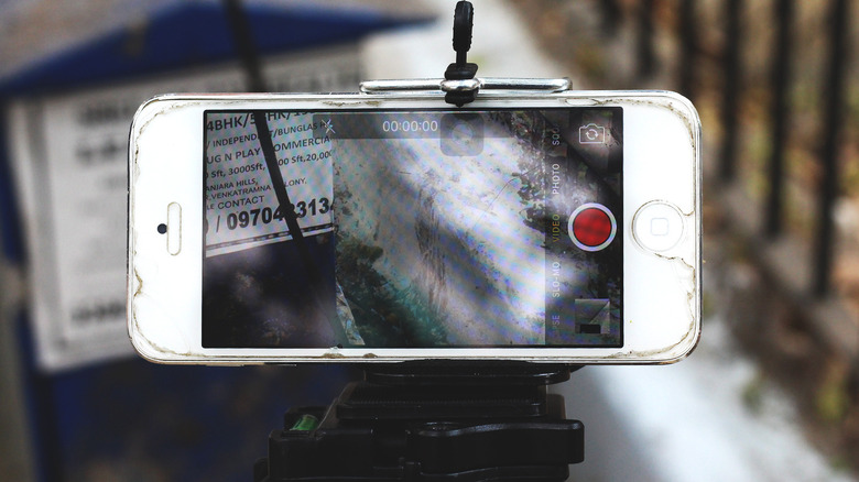 iPhone mounted on a tripod capturing video