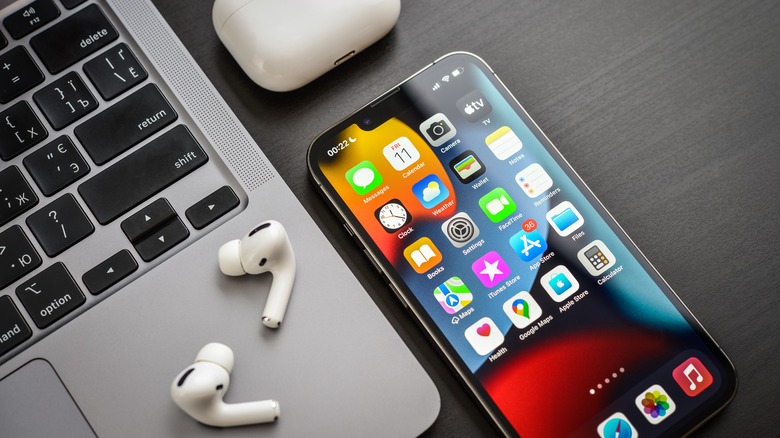 AirPods lying on MacBook
