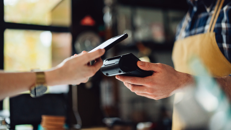 A person using tap to pay