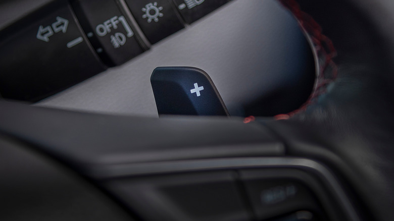 Paddle shifter behind steering wheel