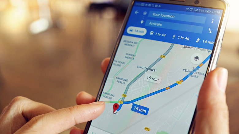 Person using Google maps on smartphone