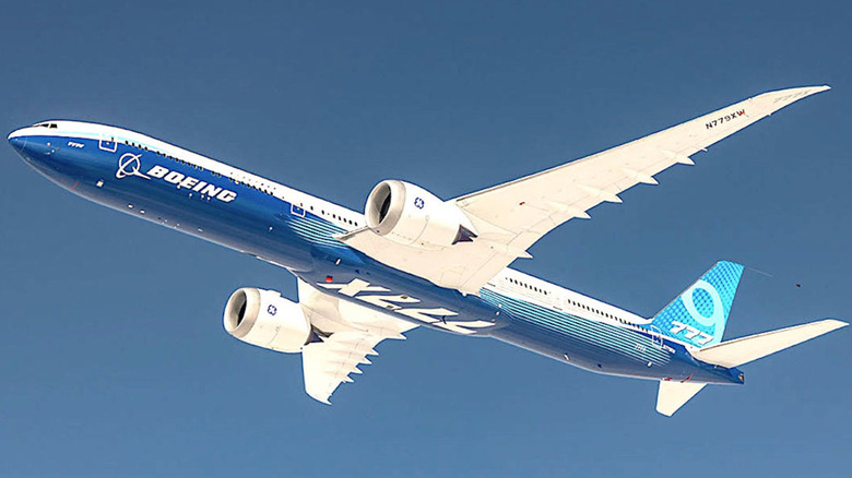 Boeing 777X flying in the sky