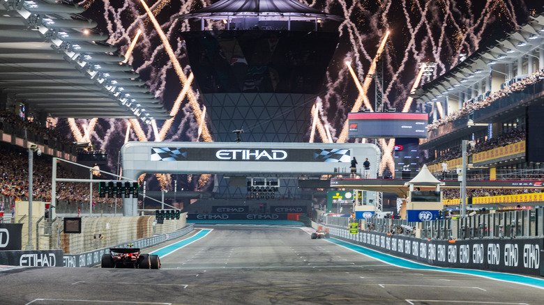 Image of cars racing down the Yas Marina circuit