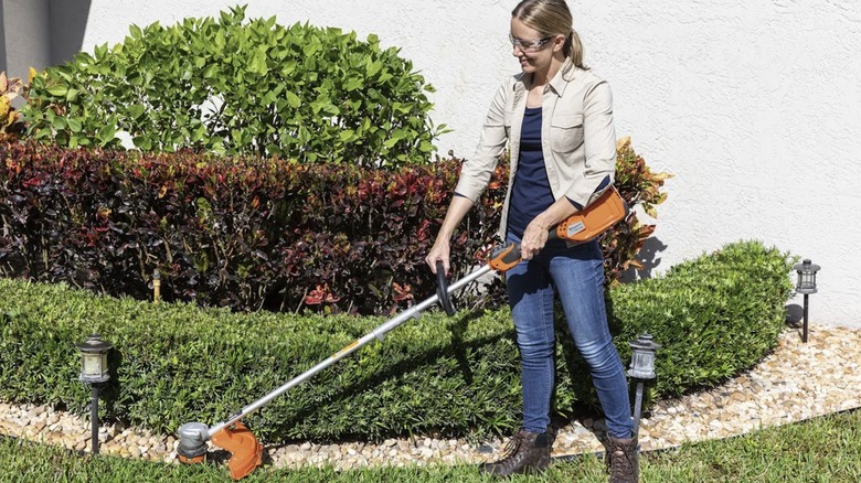 Husqvarna Weed Eater 320iL in use