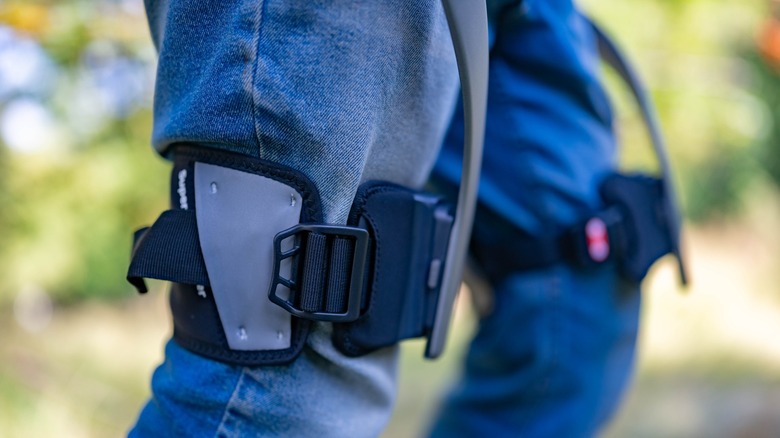 The Hypershell Pro X attached to a person's legs.