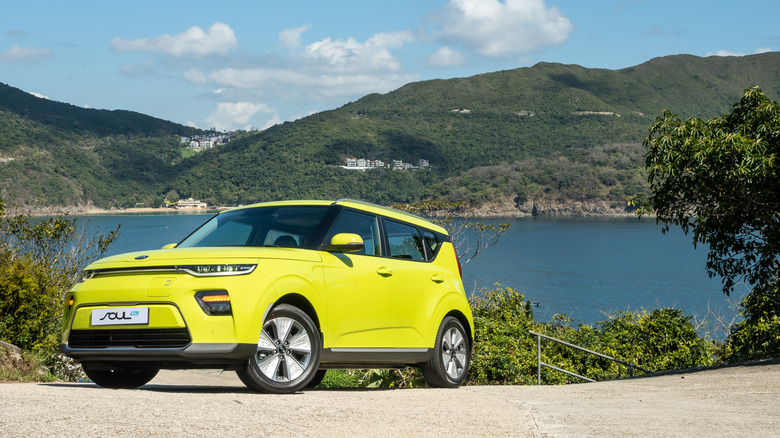 Neon yellow 2020 Kia Soul near lake