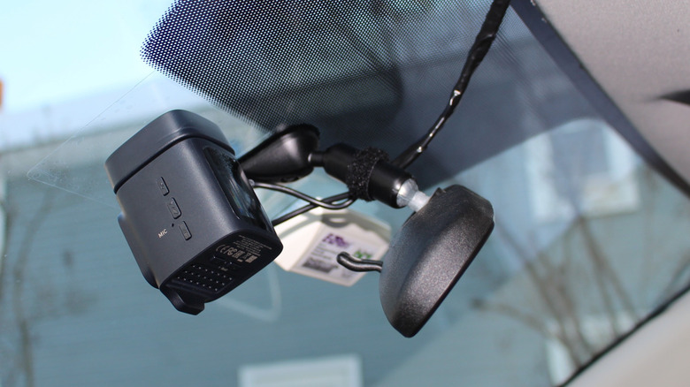 Baseus PrimeTrip VD1 Pro dashcam installed on a windshield