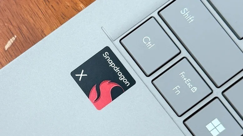 Close-up of Snapdragon X sticker on ASUS Zenbook A14