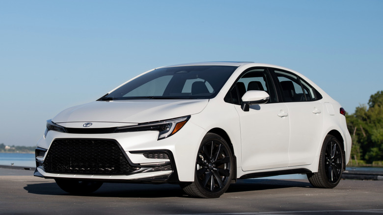 White 2026 Toyota Corolla XSE in front of water