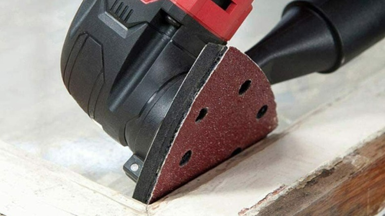 Multi-tool sanding tight corner