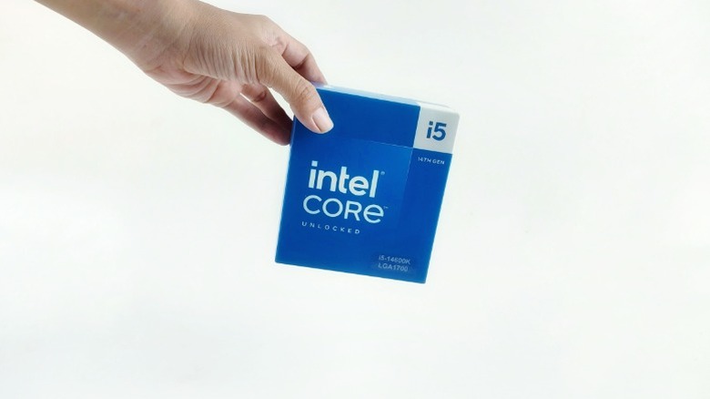 Person holding an Intel processor product box