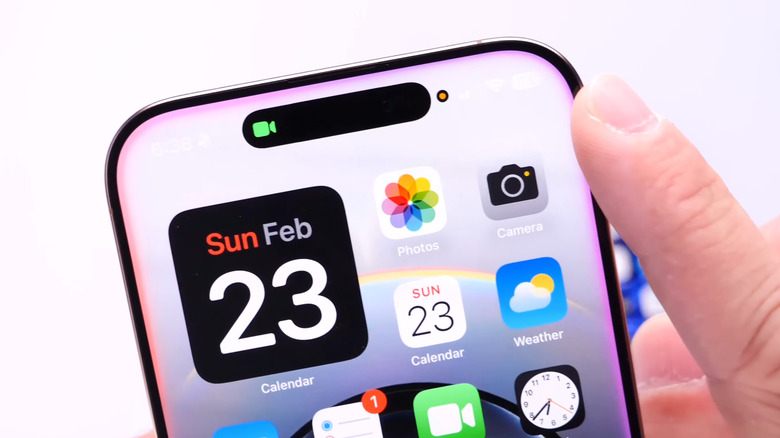 iPhone showing privacy indicator with black background