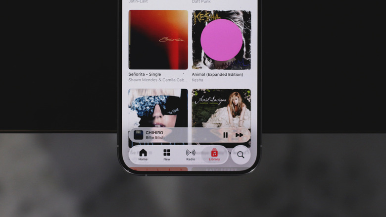 Liquid Glass elements in the Apple Music app on iOS 26
