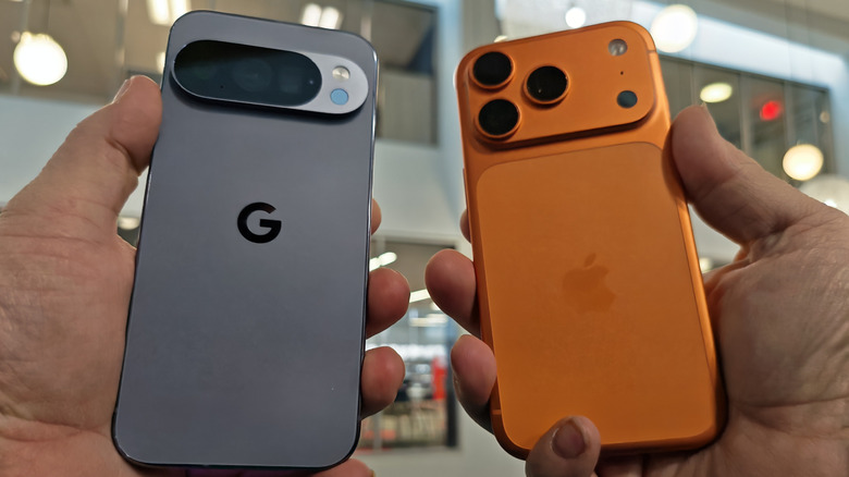 A man holding a Pixel 10 Pro and iPhone 17 Pro