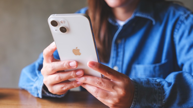 woman using iPhone