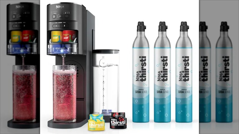 Ninja Thirsti in use with accessories beside it