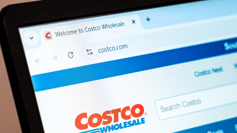 The homepage of Costco displayed on a laptop