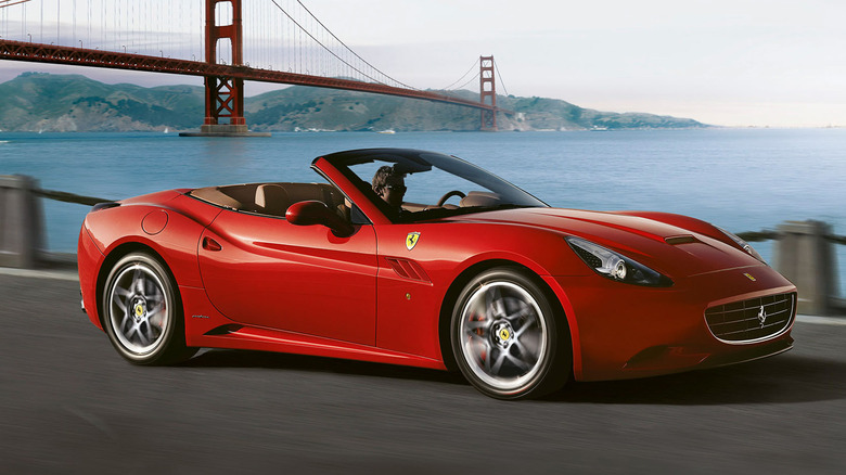Ferrari California on road with Golden Gate Bridge in the background, front-right three-quarter view