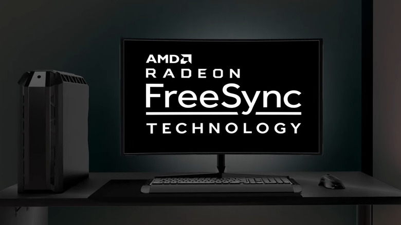 A gaming monitor on a desk showing AMD FreeSync text