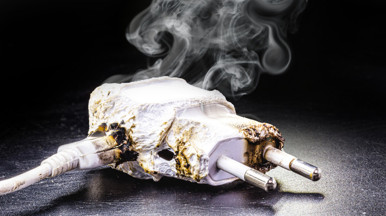 Melted and smoking phone charger