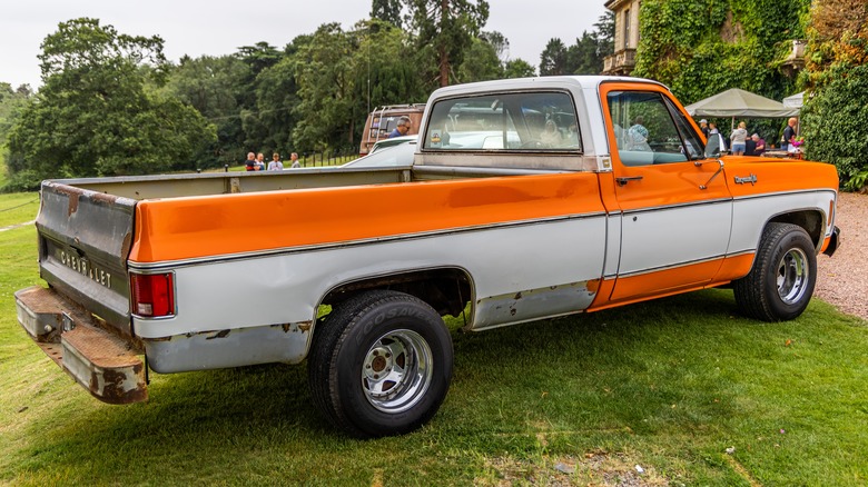 Rear 3/4 view of Chevy square body long bed pickup truck