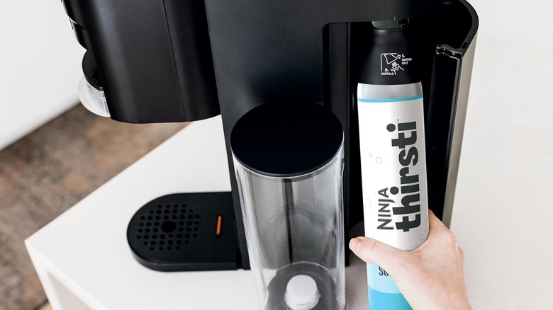 Taking out a Ninja Thirsti CO2 canister