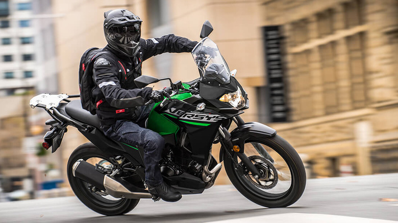 Person riding a Kawasaki Versys-X 300 in the city
