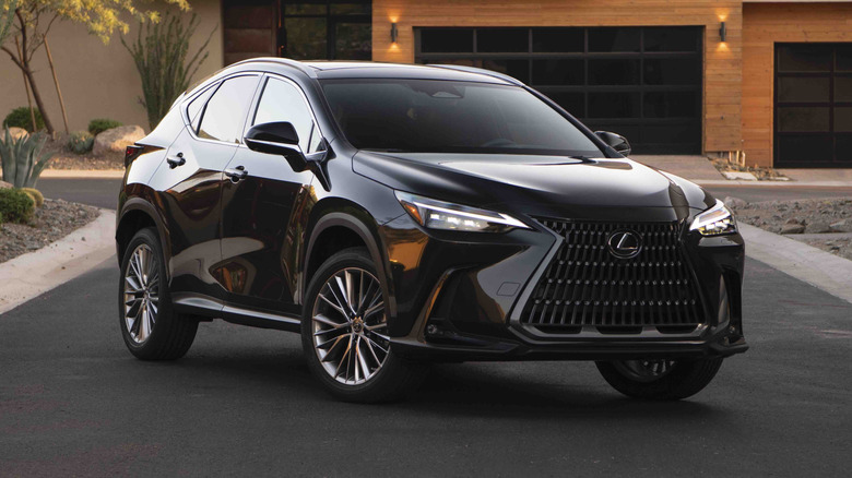 black 2025 Lexus 350 parked in driveway
