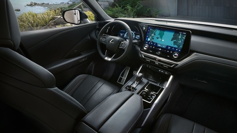 Lexus TX interior showing the dashboard and front seats