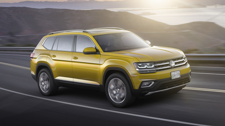 Volkswagen Atlas driving on a road with the Golden Gate Bridge in the background