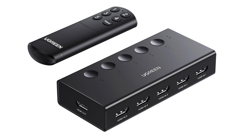 UGREEN 5-in-1 HDMI Switch with remote control on a plain background