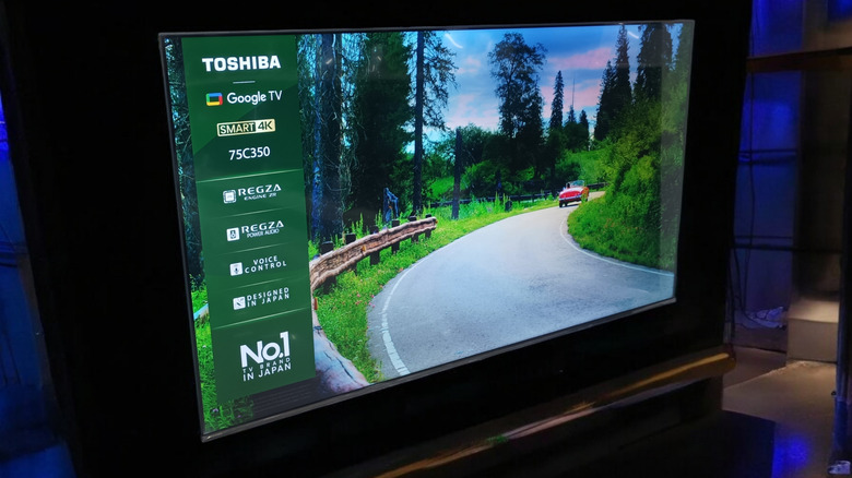 A Toshiba 75C350 TV set displaying its features