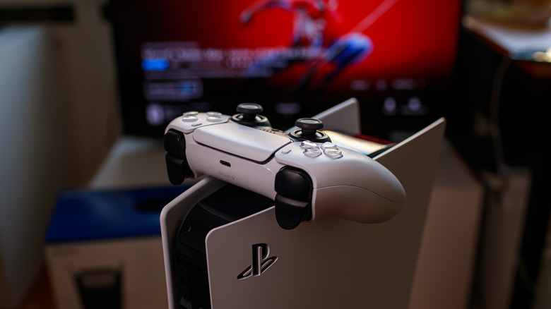 PS5 DualSense in front TV