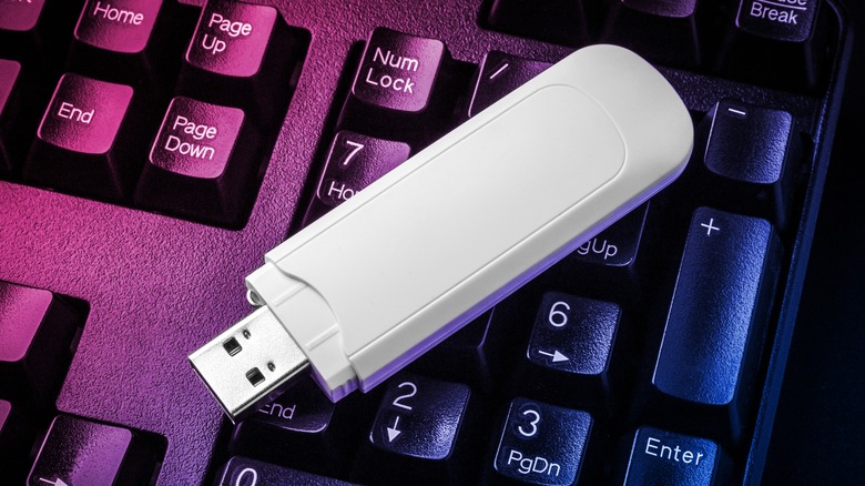 Flash drive sitting on keyboard