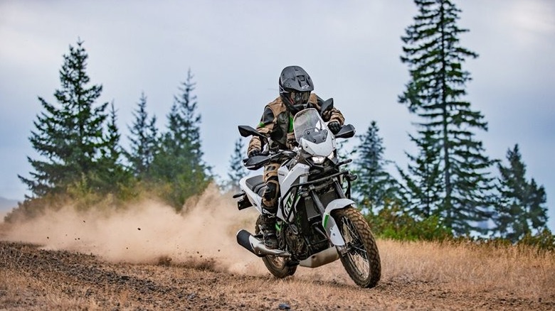 Kawasaki KLE500 being ridden on a dirt road
