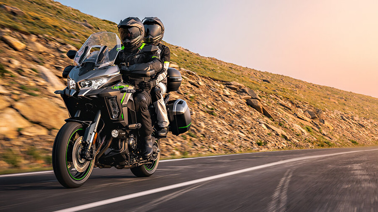 Kawasaki Versys 1100 with two riders in the desert