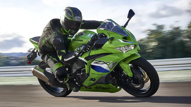 Rider racing Ninja ZX-4R on track