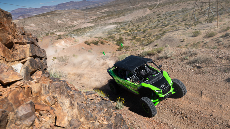 2026 Kawasaki Teryx 5 H2 going up a hill