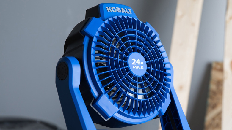 Kobalt 24V Lowe's Personal Fan in a workshop with wood